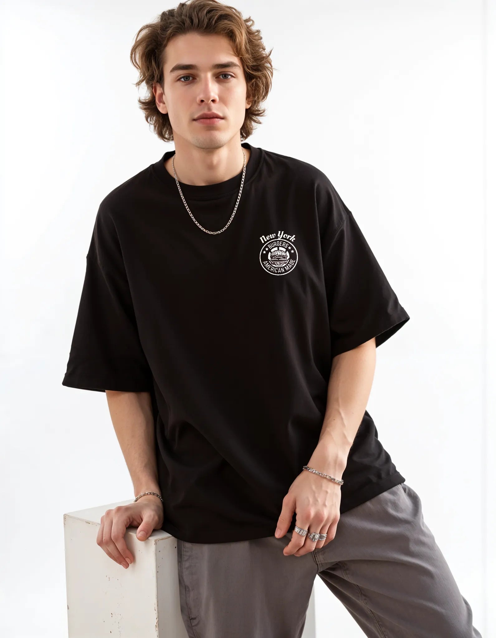 Empulse™ Sorona black New York t-shirt worn casually by smiling model in relaxed fit
