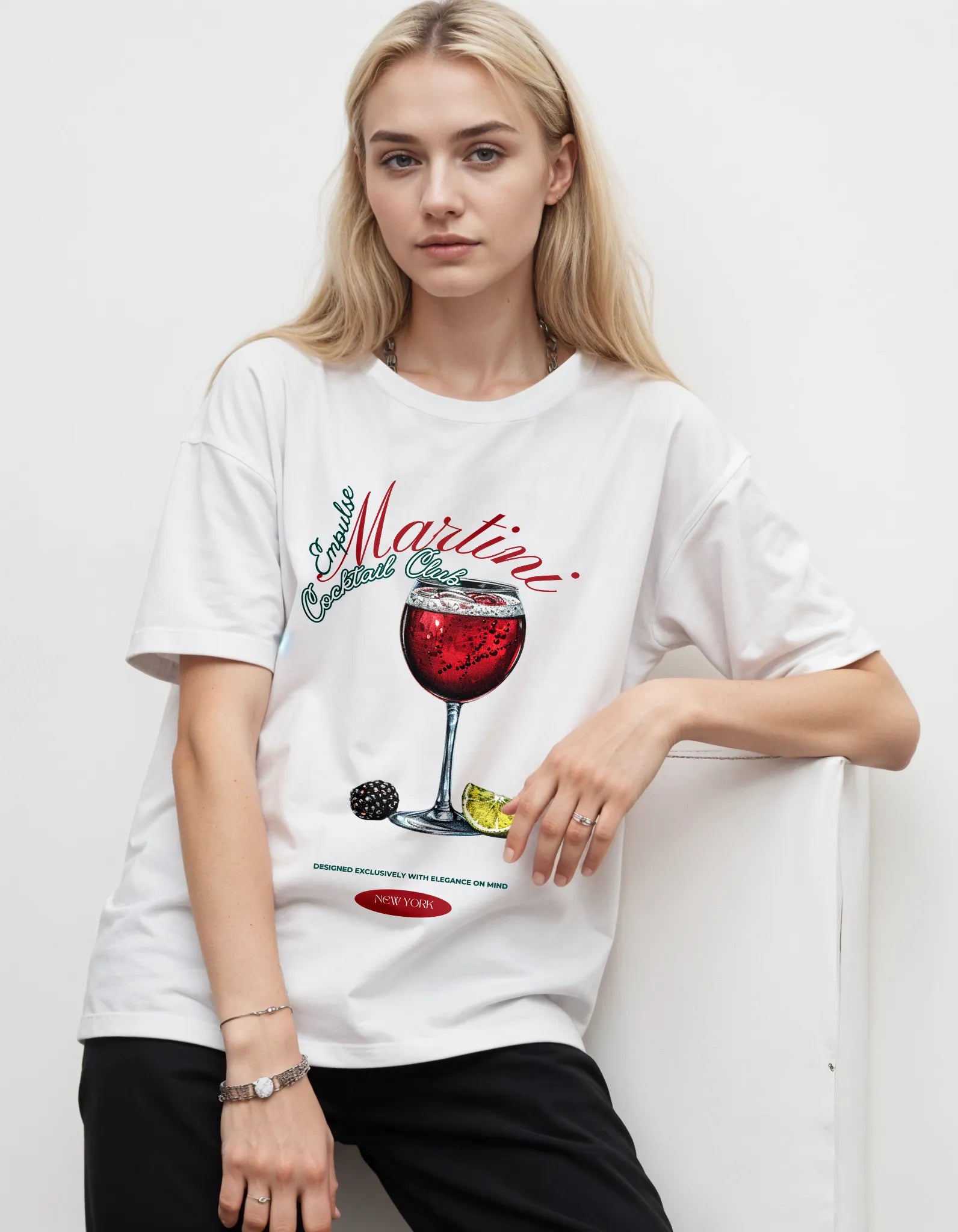 Empulse™ Shiraz Club t-shirt in white Sorona blend with oversized red wine glass graphic, worn by female model