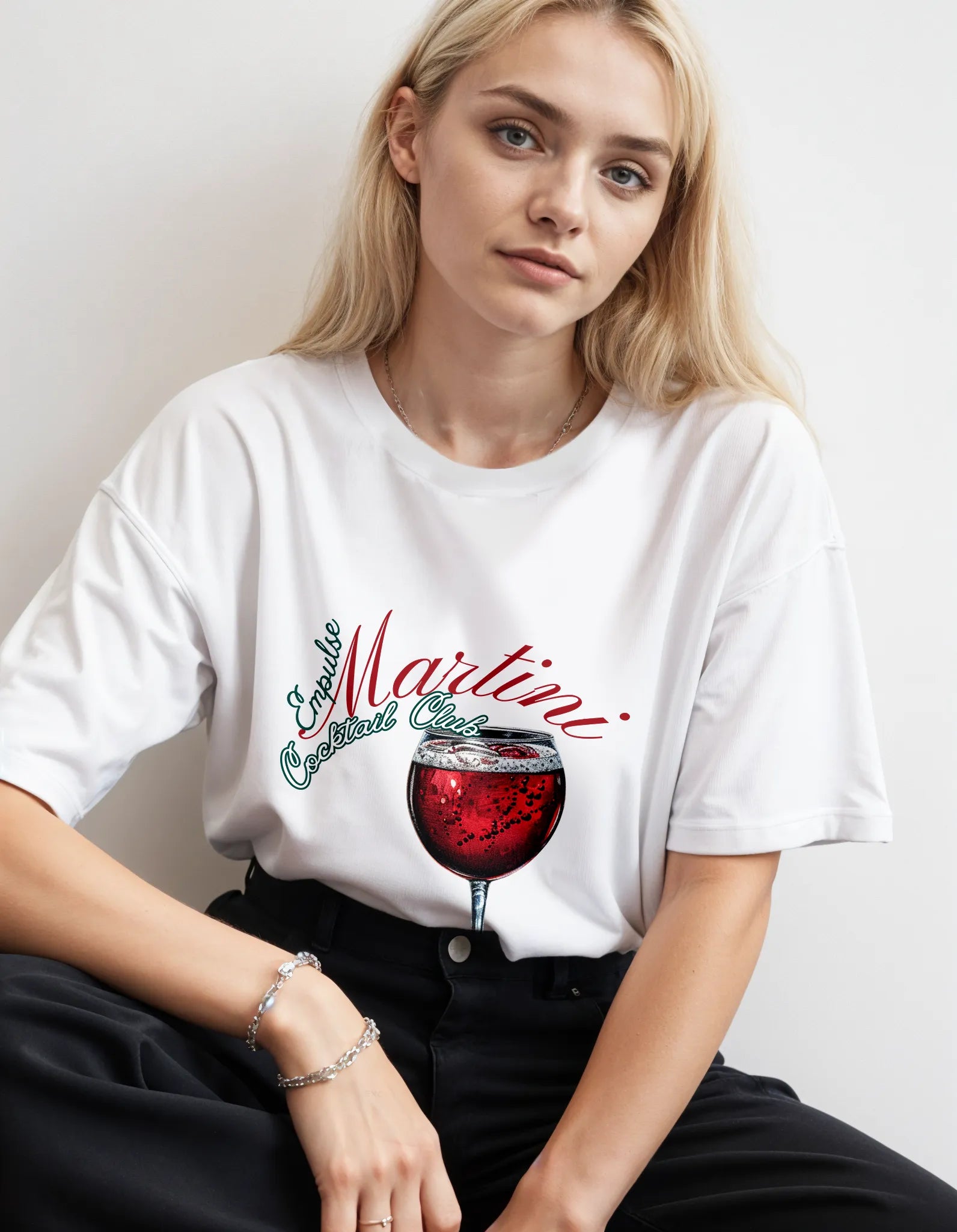 Empulse™ Sorona tee in white styled in studio, featuring playful Shiraz print and relaxed oversized fit