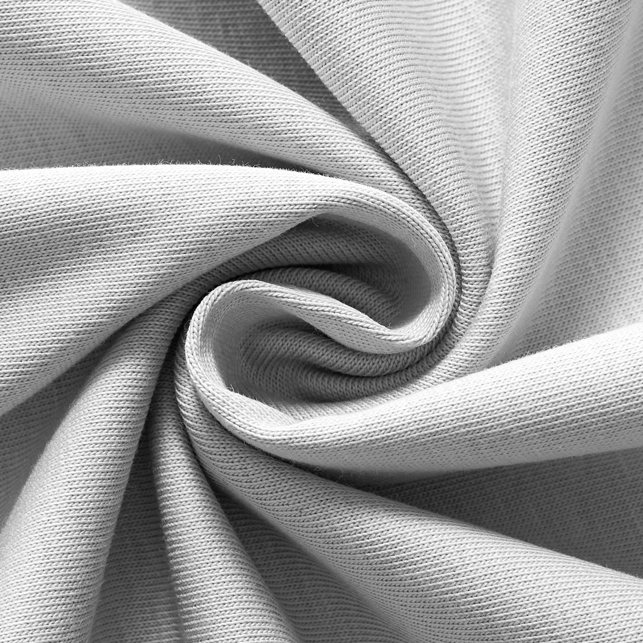 Close-up of Empulse™ white Sorona cotton fabric showcasing breathable and eco-conscious texture