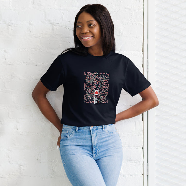 Confident female pose in Empulse® Tokyo Stacks Tee with bold graphic