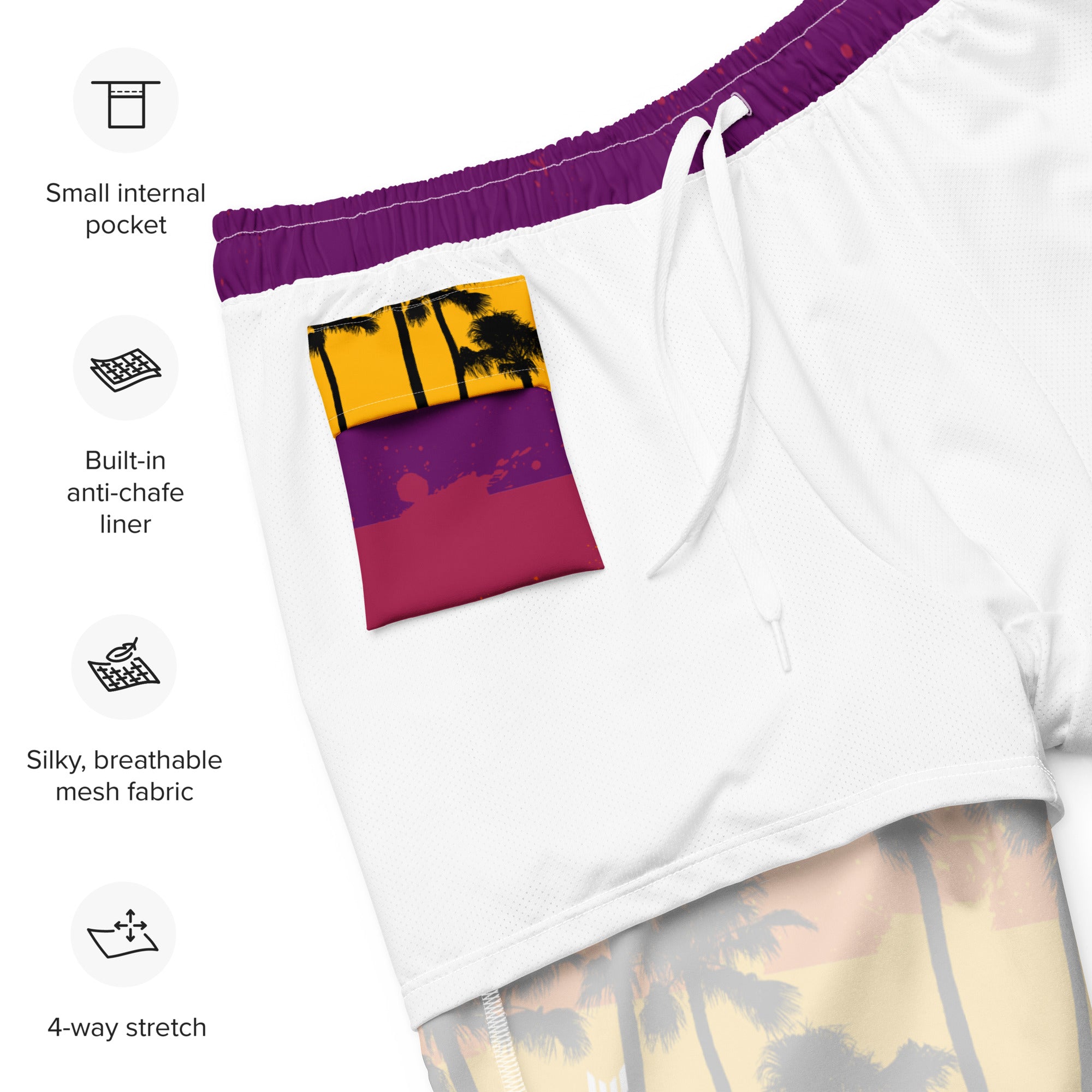 Flat lay of Empulse™ Tropical swim shorts showing inside waistband label and sizing chart