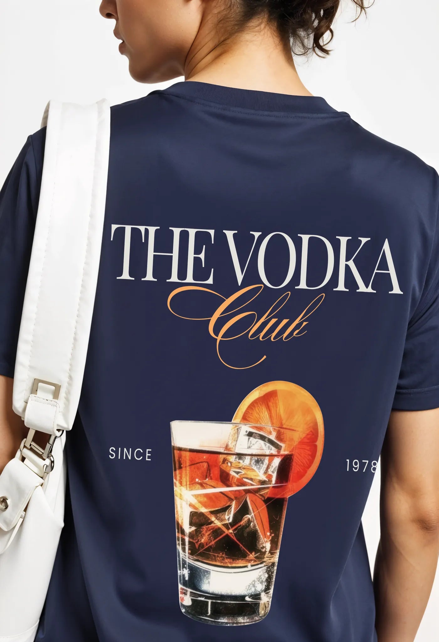 Empulse™ Vodka Club t-shirt in navy Sorona blend showing cocktail backprint and logo over shoulder