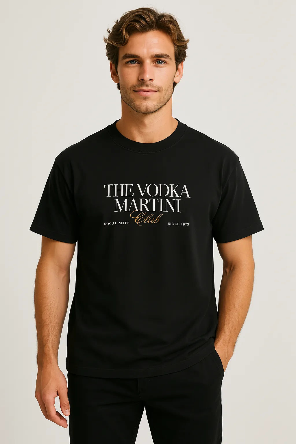 Front view of Empulse™ Vodka Martini Sorona tee in black with bold white type, male model standing