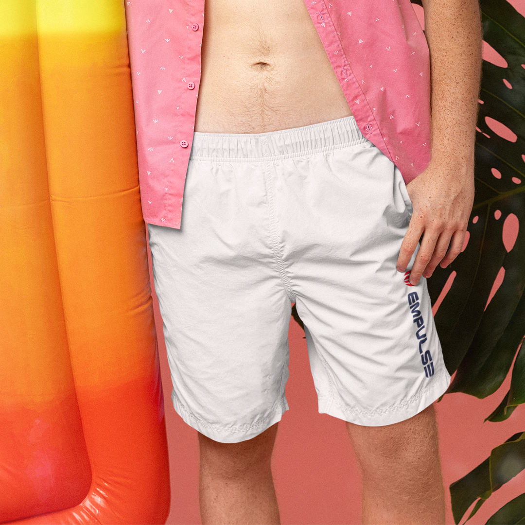  Empulse™ White men’s swim shorts styled with open shirt and summer pool float
