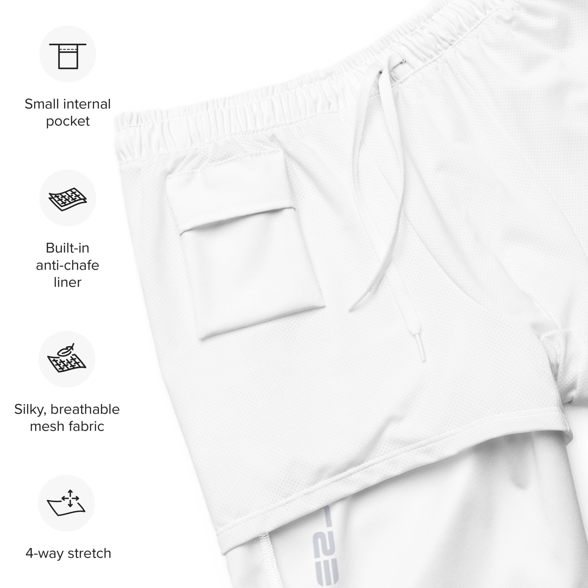 Empulse™ White shorts flat lay with inside label and sizing guide displayed