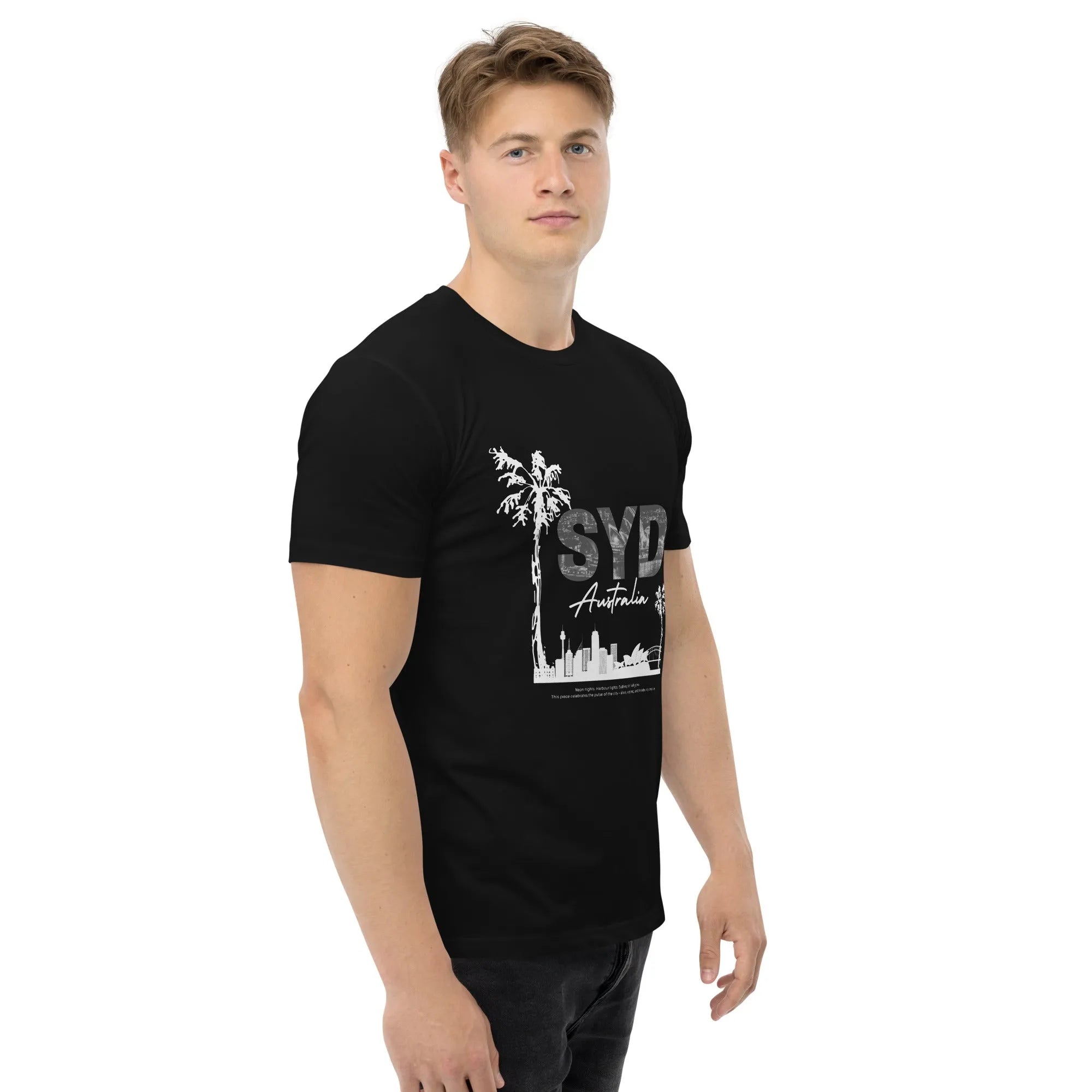 Male model in Empulse™ Sydney black tee featuring bold SYD print with skyline and palm graphics