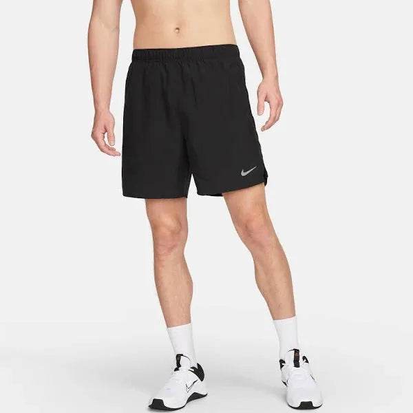 Nike Pocketed Dri-FIT Shorts – front view worn by male model with white socks and sneakers.