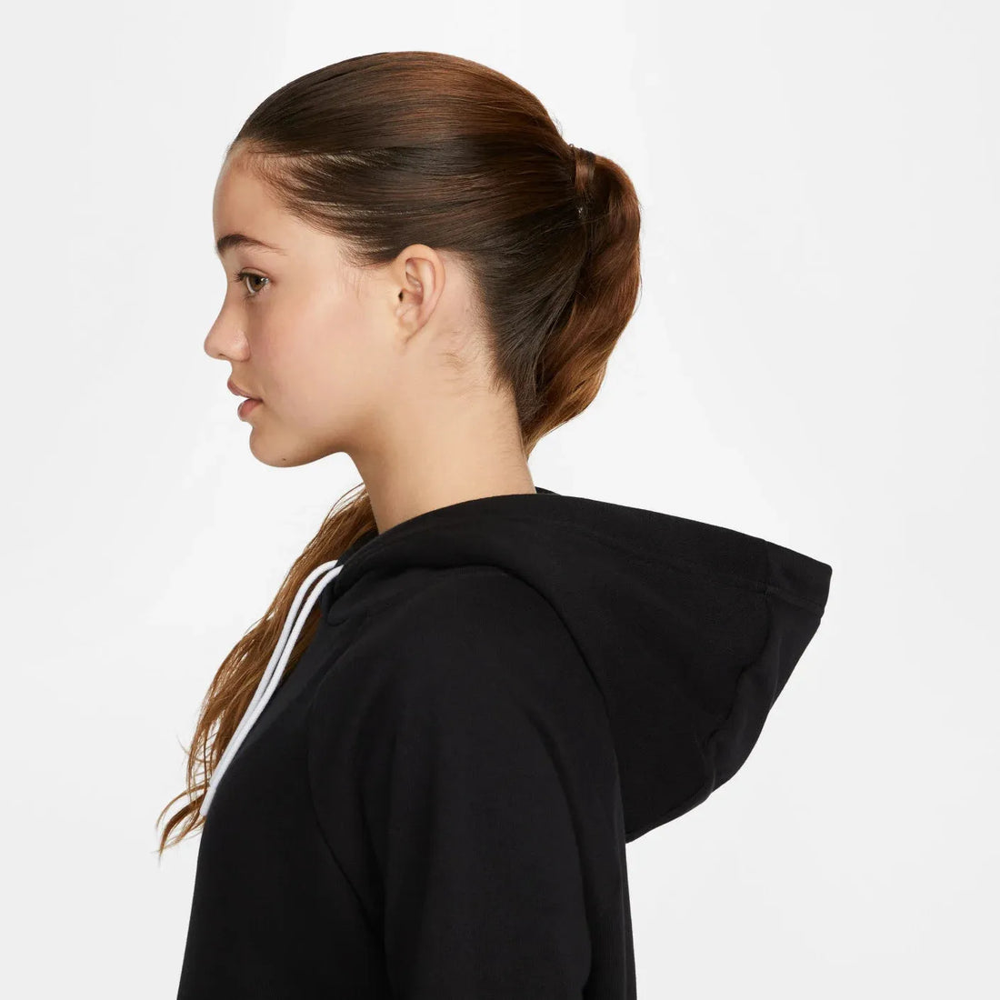Side profile of woman wearing Nike Park 20 hoodie black CW6894-010