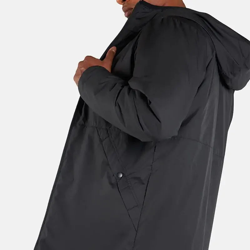Nike Stadium Jacket CW6156 black – close-up showing zippered side pocket and drawcord, Empulse™