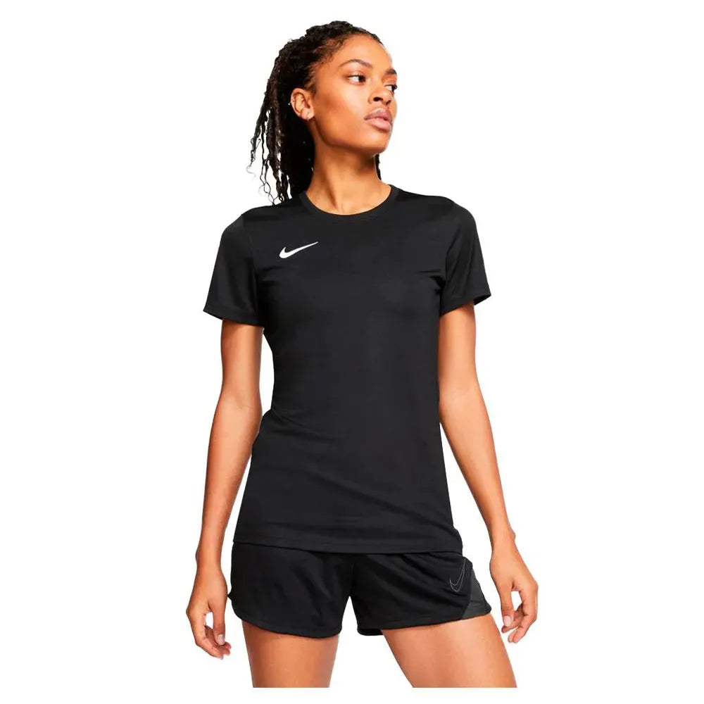 Full-body image of model in black Nike Women's Park 7 Jersey with matching shorts