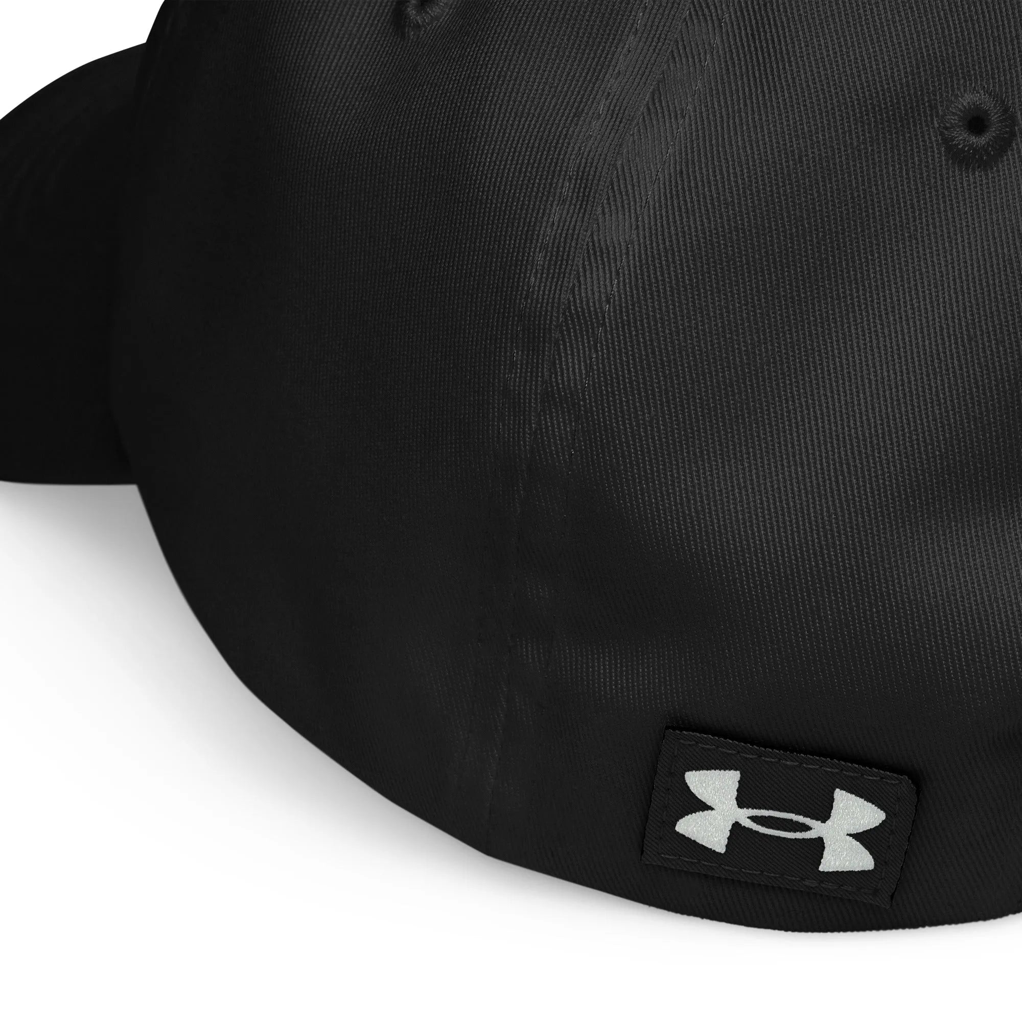 Close-up of Under Armour black hat logo on front panel