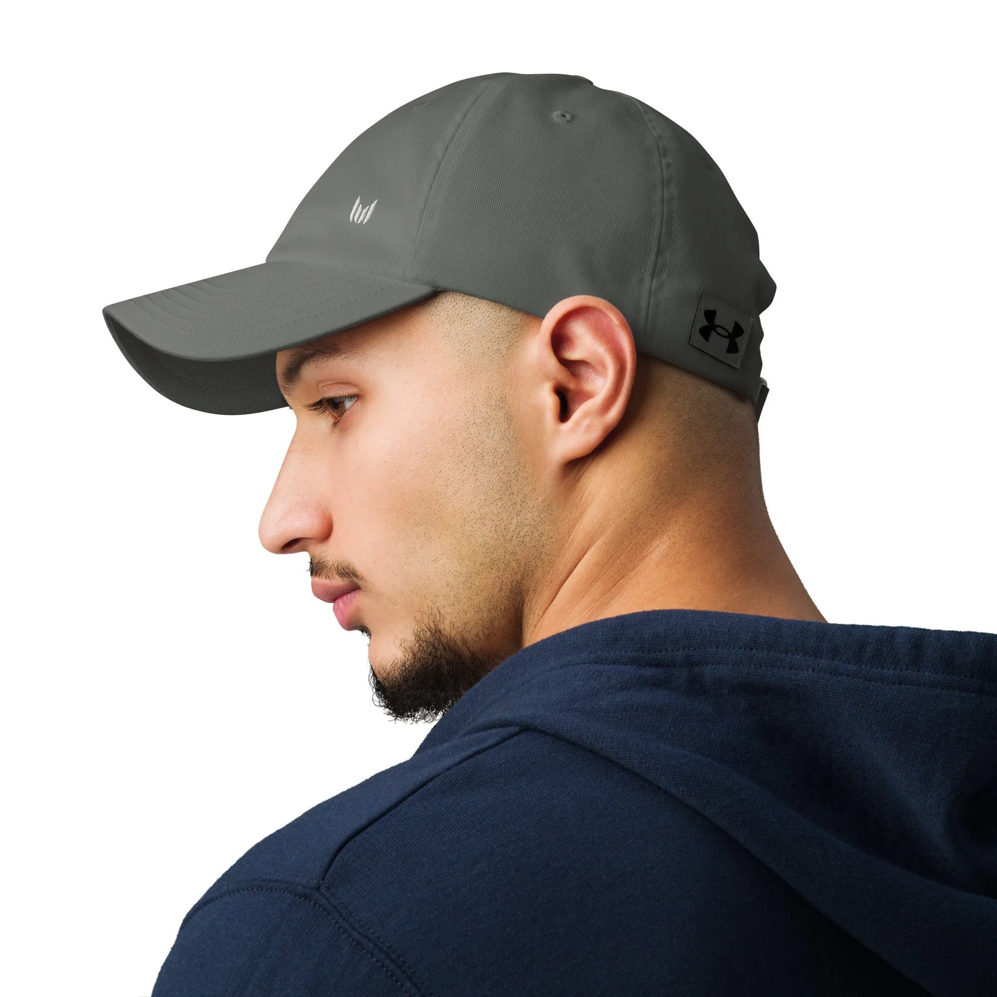 Grey Under Armour dad hat worn by model with left side profile