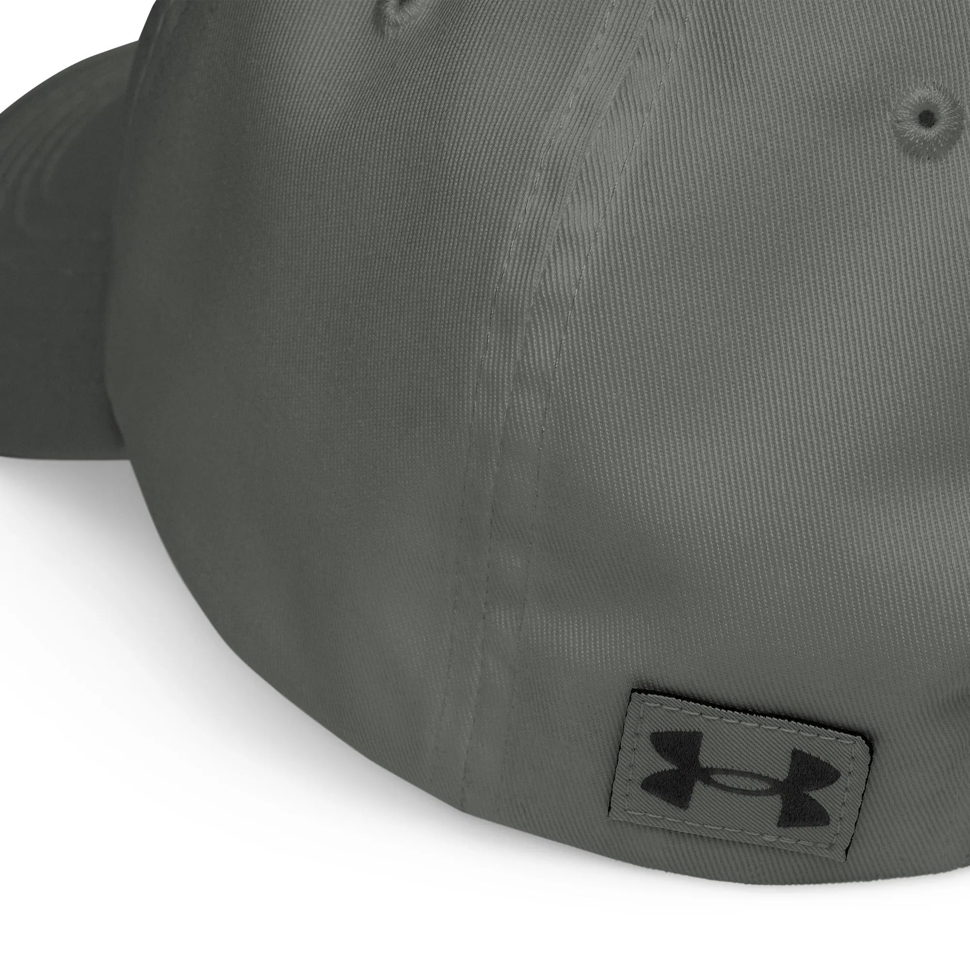 Grey Under Armour dad hat worn by model with side profile