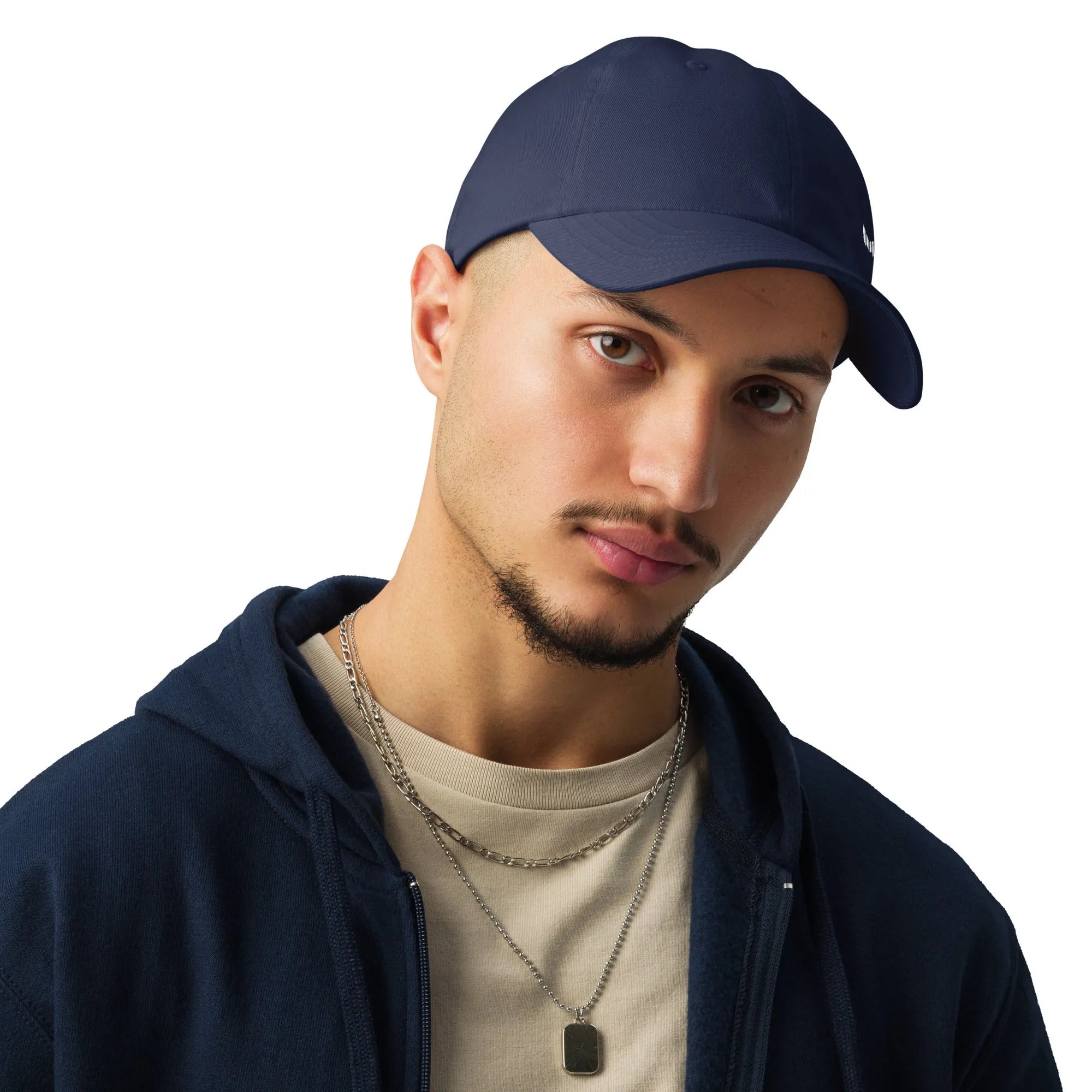 Navy Under Armour dad hat modeled with neutral tee and hoodie