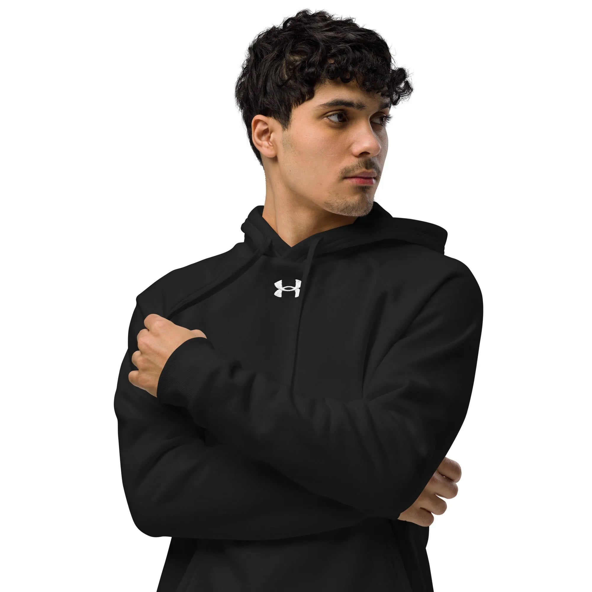 Under Armour black hoodie modeled with hands in pocket pose