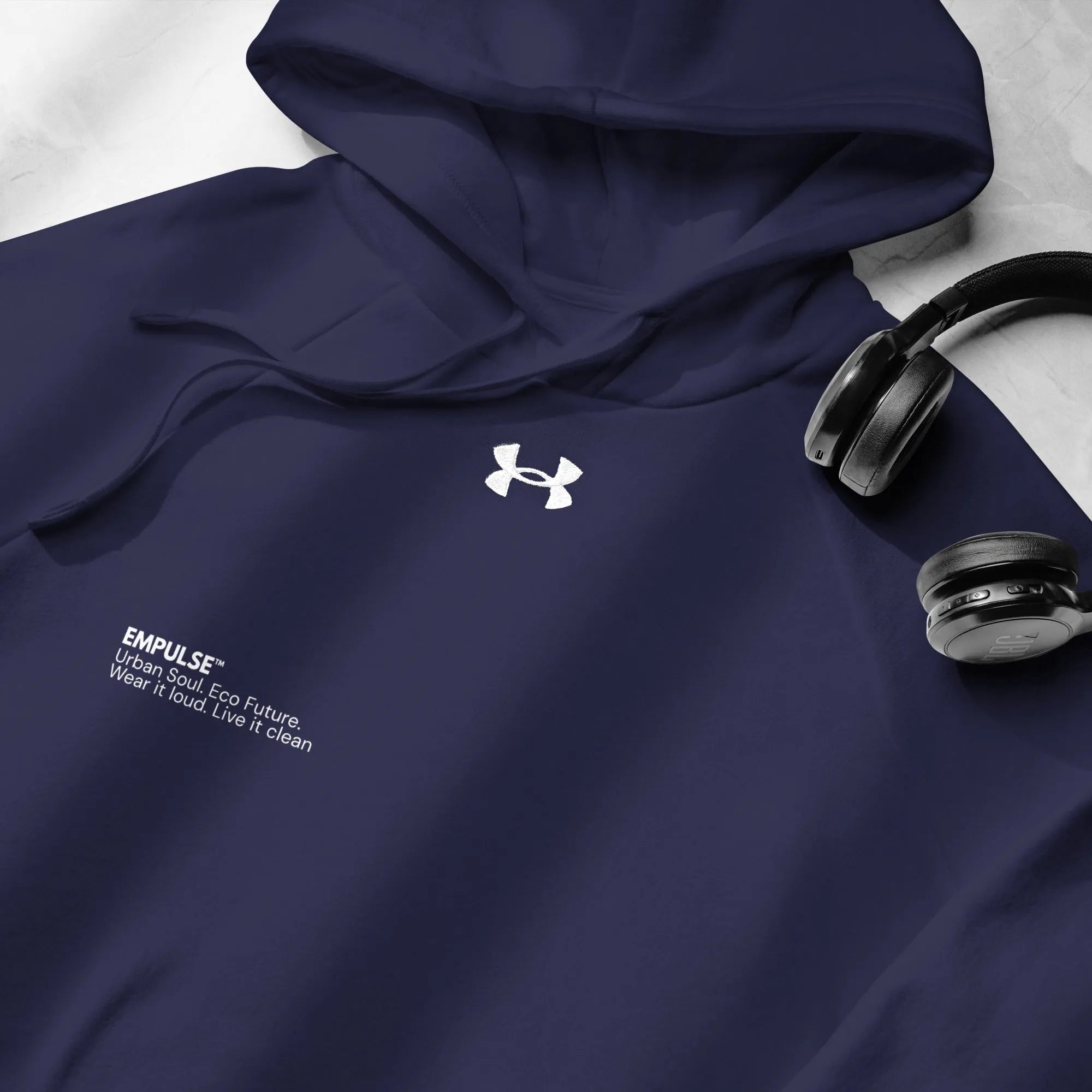 Flat lay of Under Armour navy hoodie with kangaroo pocket