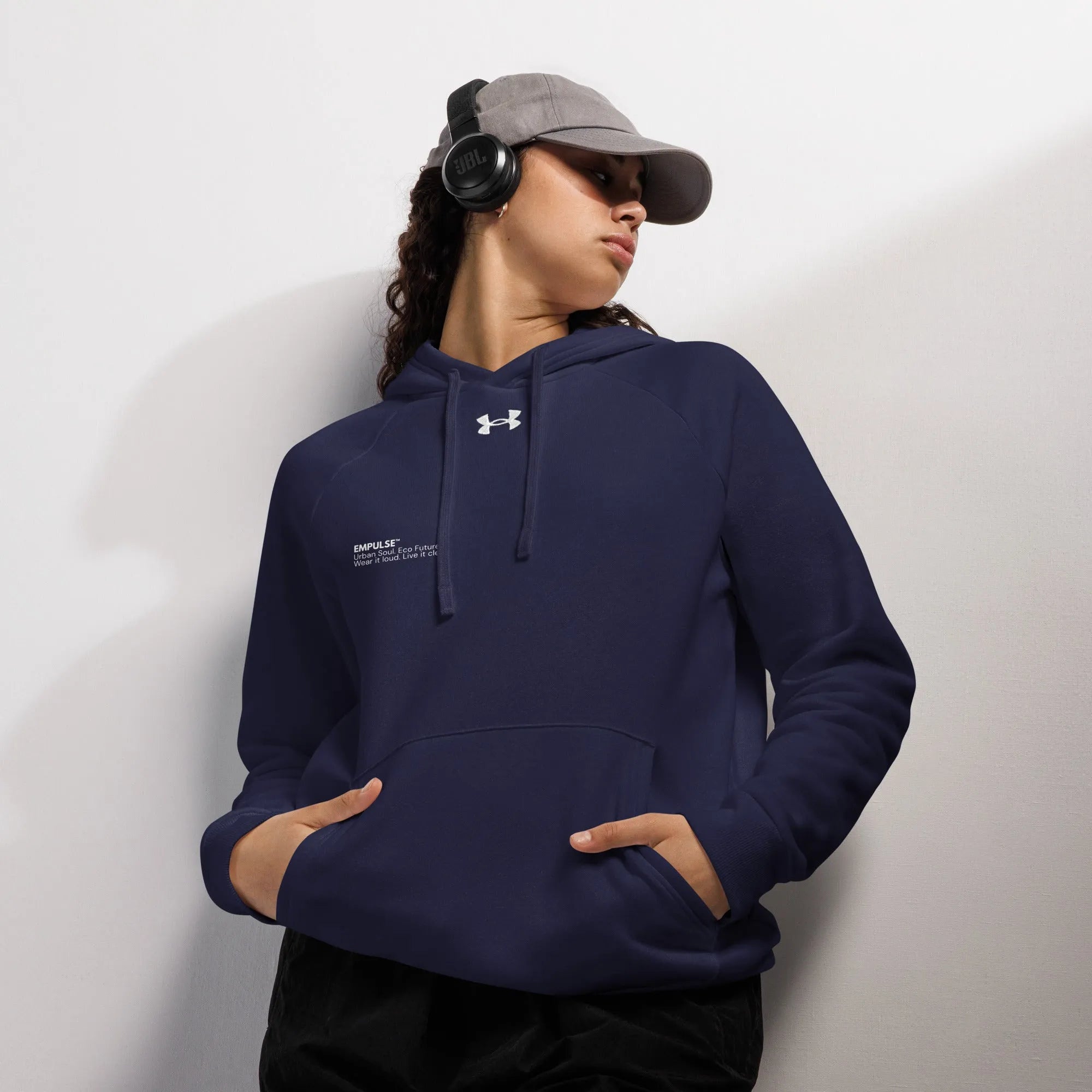 Under Armour navy fleece hoodie worn by female model, front view